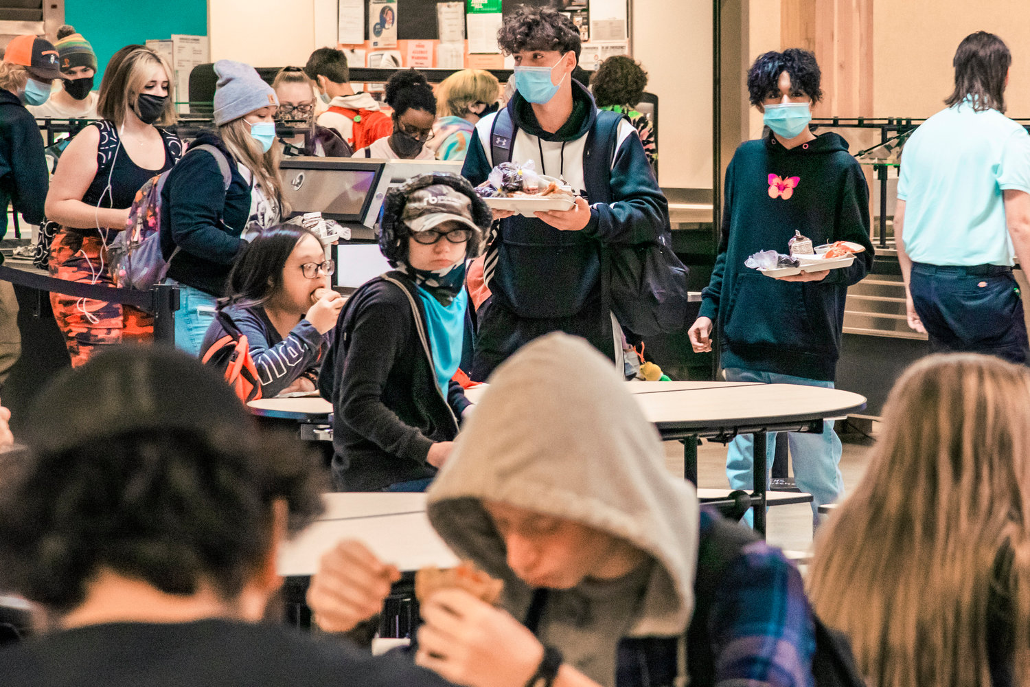 At Centralia High School students are now allowed to sit without masks and eat at a table with their peers, but only in groups of four during lunch.