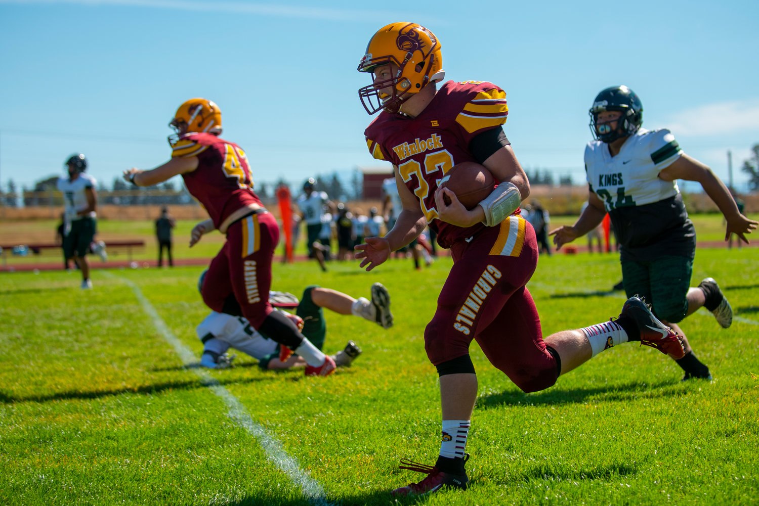 Winlock quarterback Neal Patching takes the first snap of the game for a 53-yard touchdown against Muckleshoot Tribal at home on Saturday.