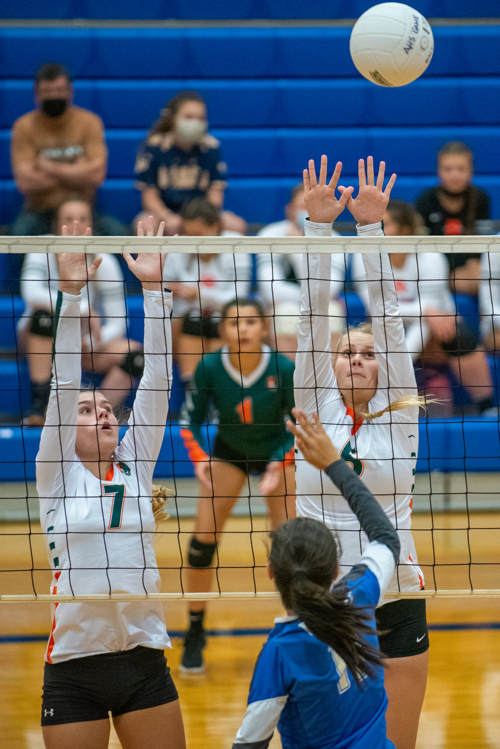 Morton-White Pass' Maddie Clevenger (7) and Breejah Townsend (5) go for a block against Adna's JV team on Saturday.
