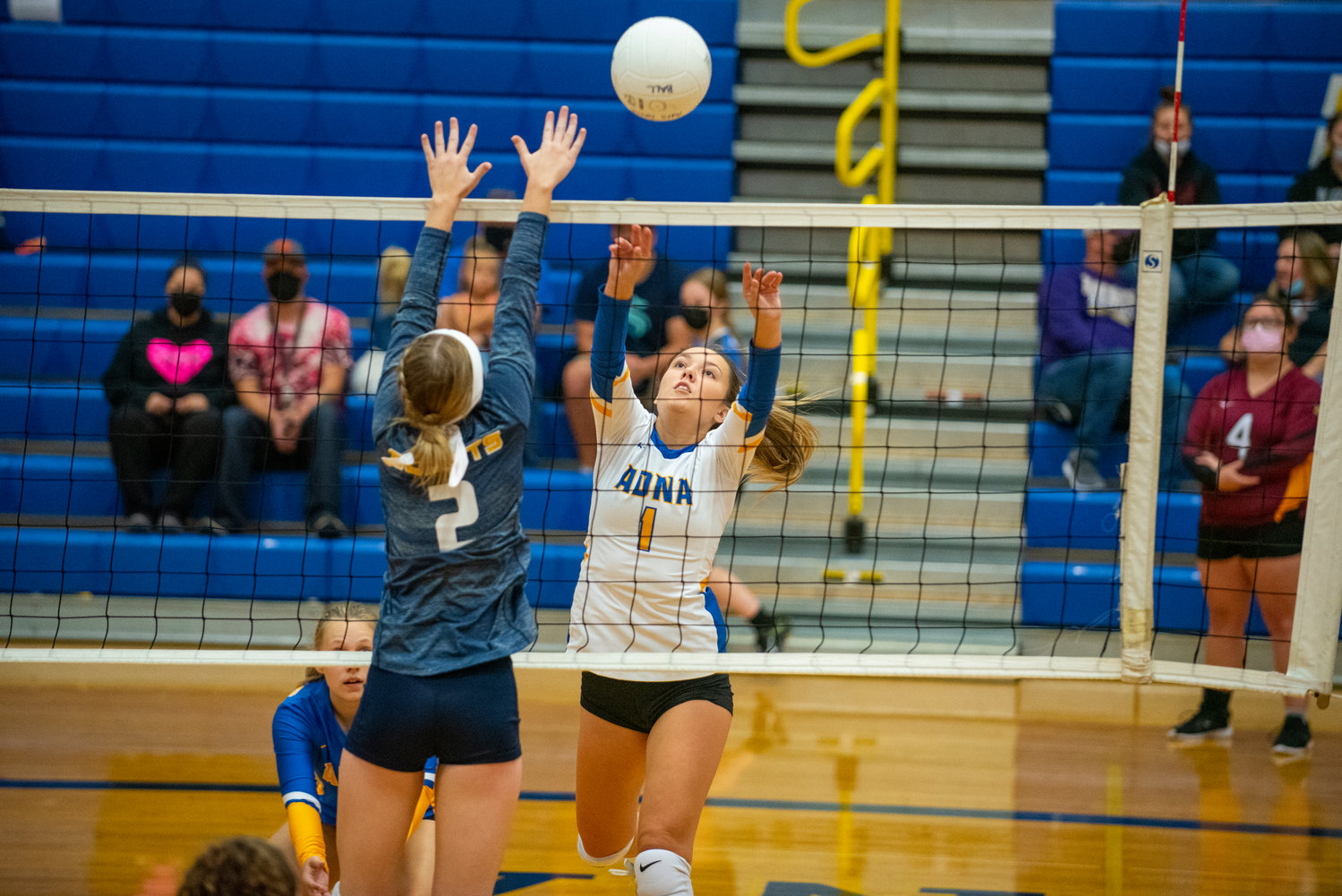 Adna outside hitter Alyssa Davis (1) sends the ball over the net against Naselle during the Pirates' tournament on Saturday.