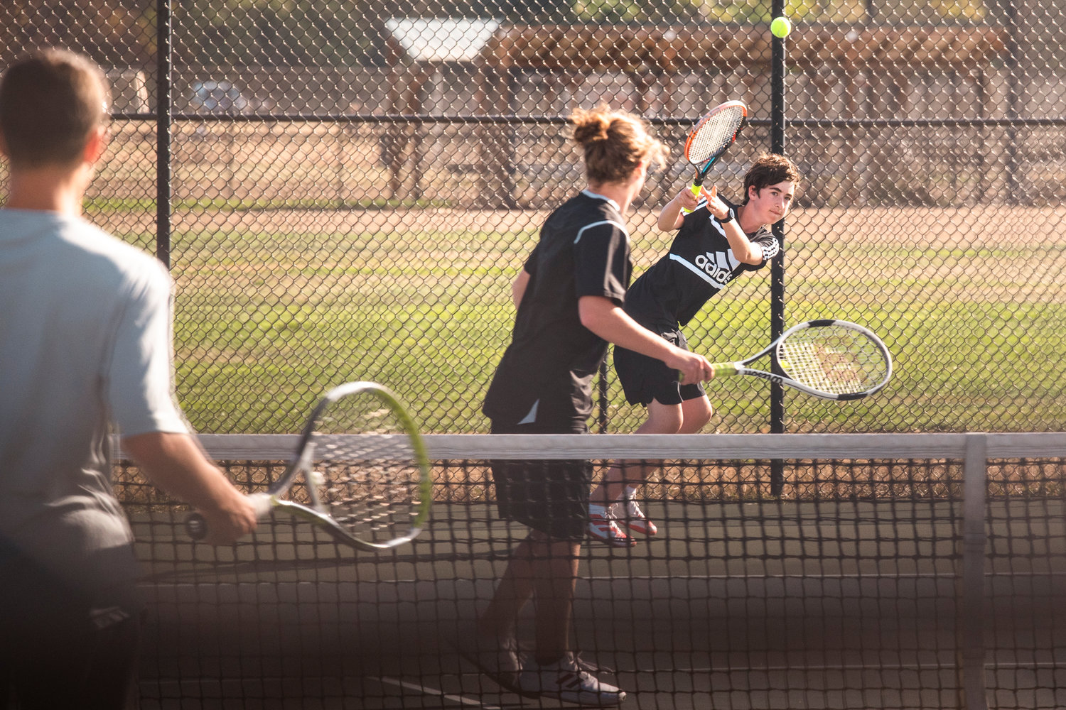W.F. West competes in a tennis match against Centralia.
