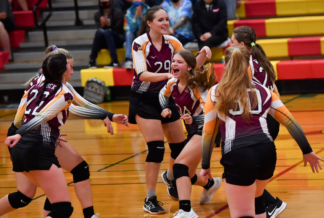 Winlock players celebrate a point scored against Stevenson at home on Tuesday.