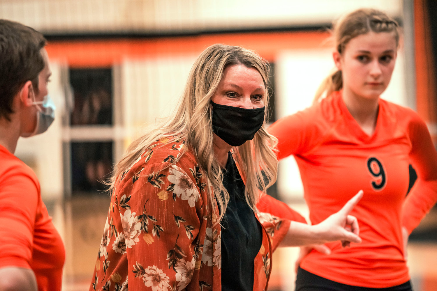 Napavine’s Head Coach Monica Dailey talks to players during a match at home against Toledo Tuesday night.