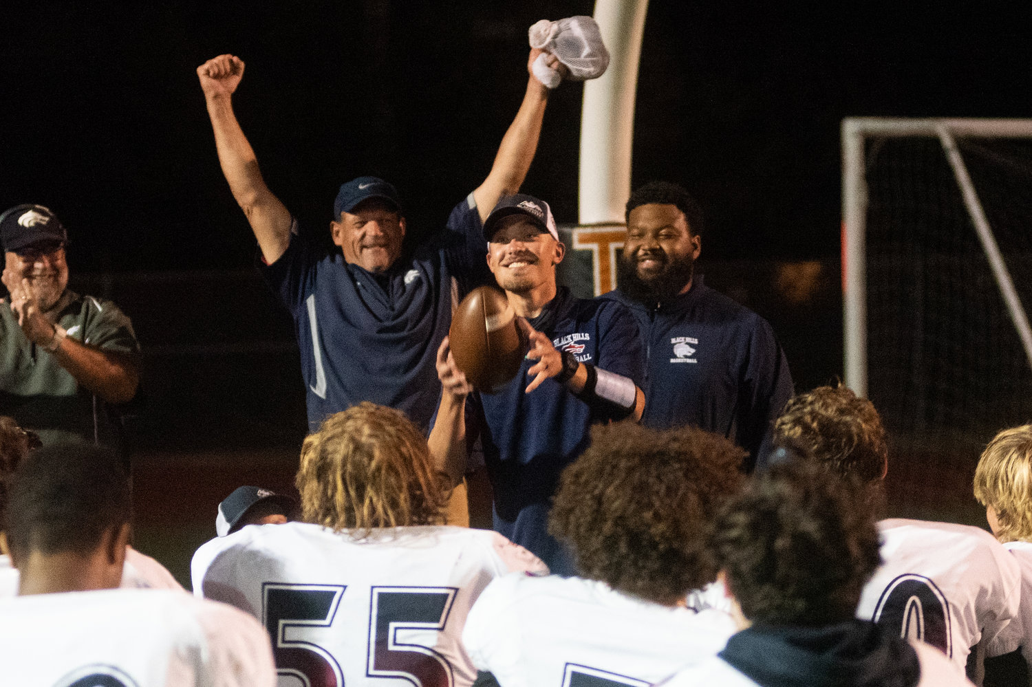 Black Hills football coach Garrett Baldwin celebrates his first win as head coach at his alma mater in a win over Centralia.