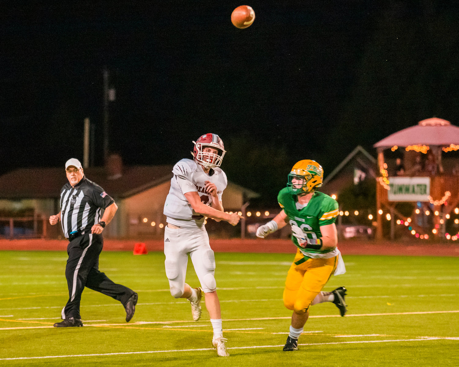 W.F. West’s quarterback Gavin Fugate (9) throws a pass during a game against Tumwater Friday night.