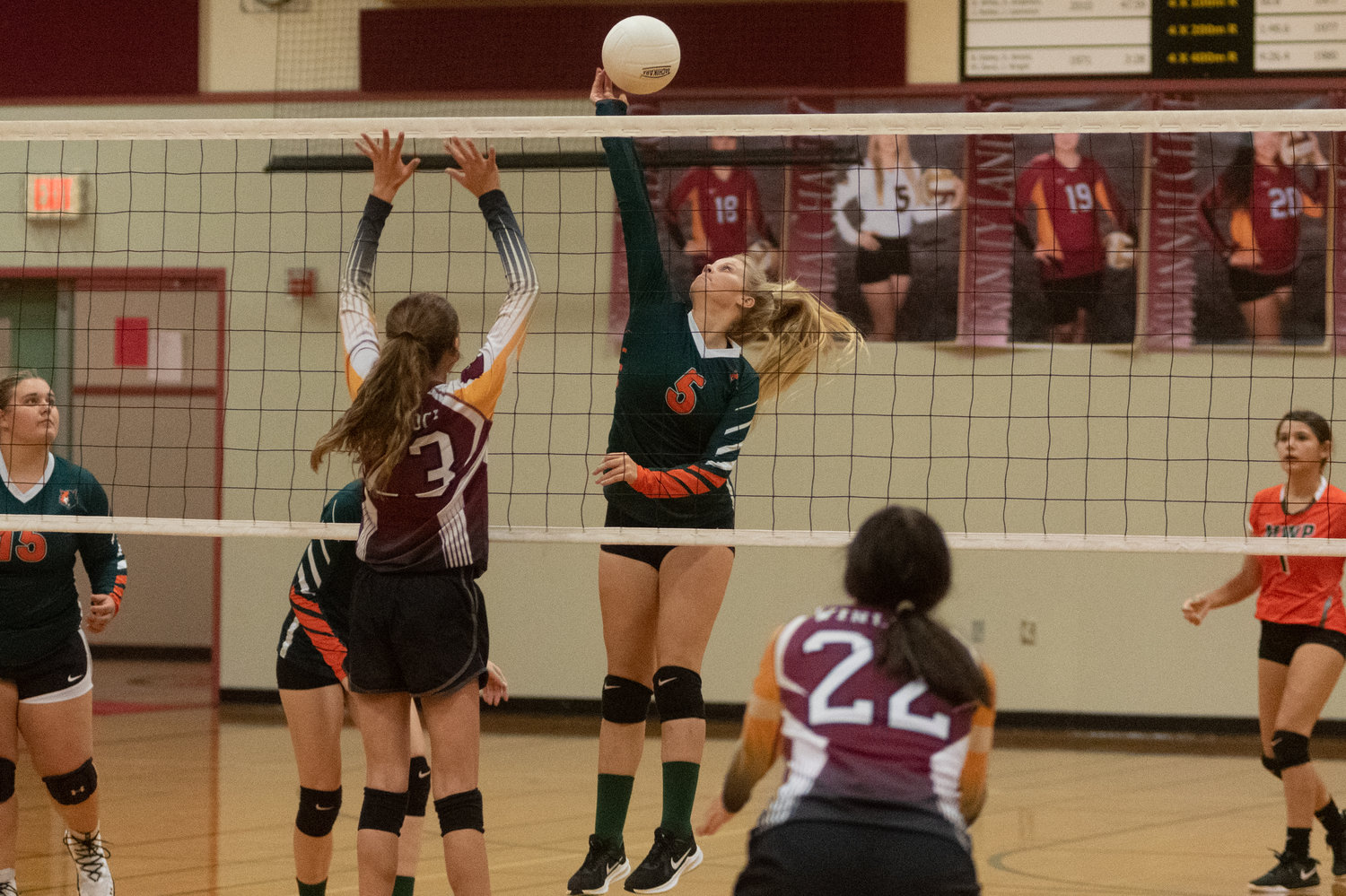 MWP middle Breejah Townsend sends a spike down the middle in the Timberwolves four set loss to Winlock Tuesday night.
