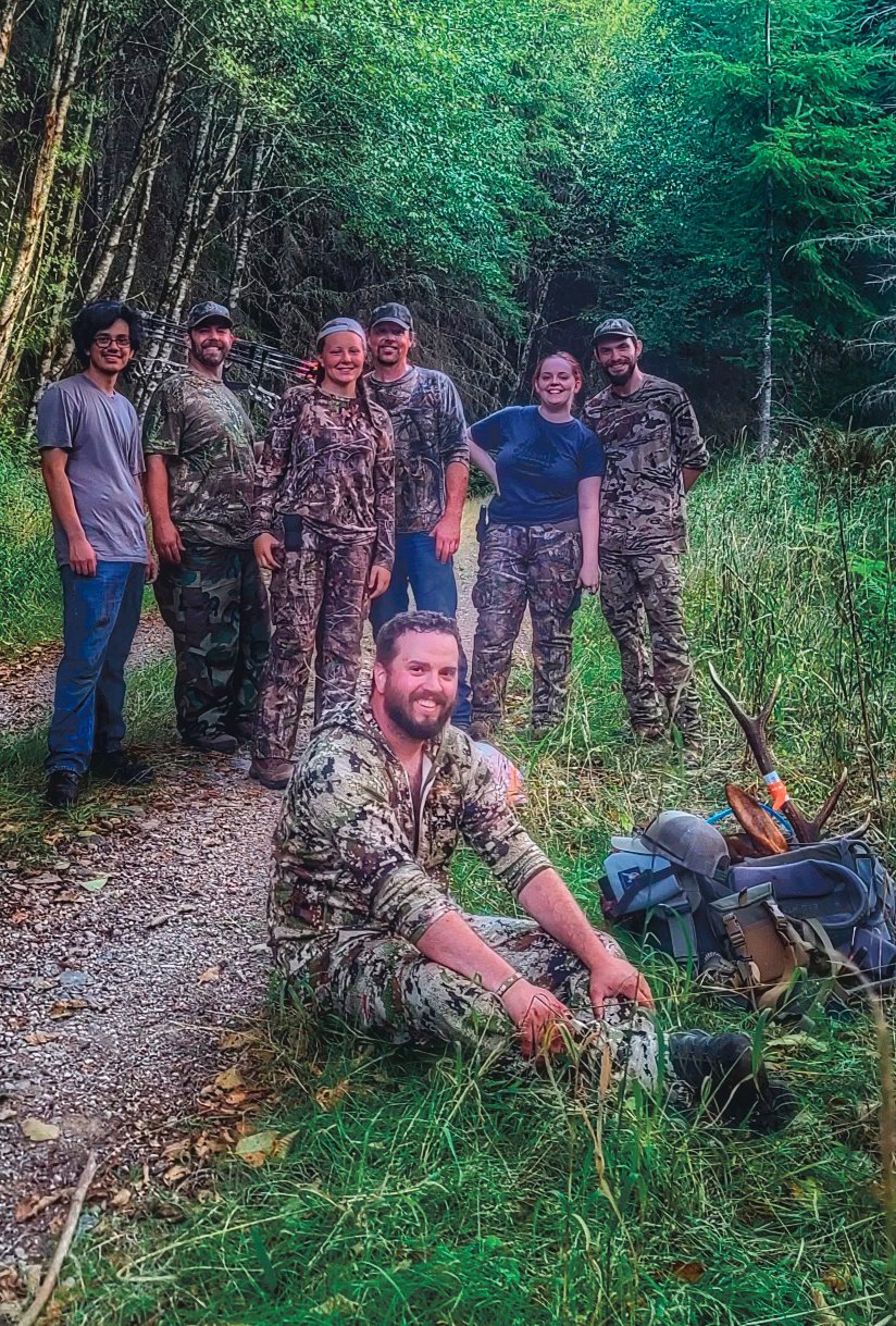 Josh Westley, front, poses with everyone who helped him haul his elk out of the woods on Sept. 11.