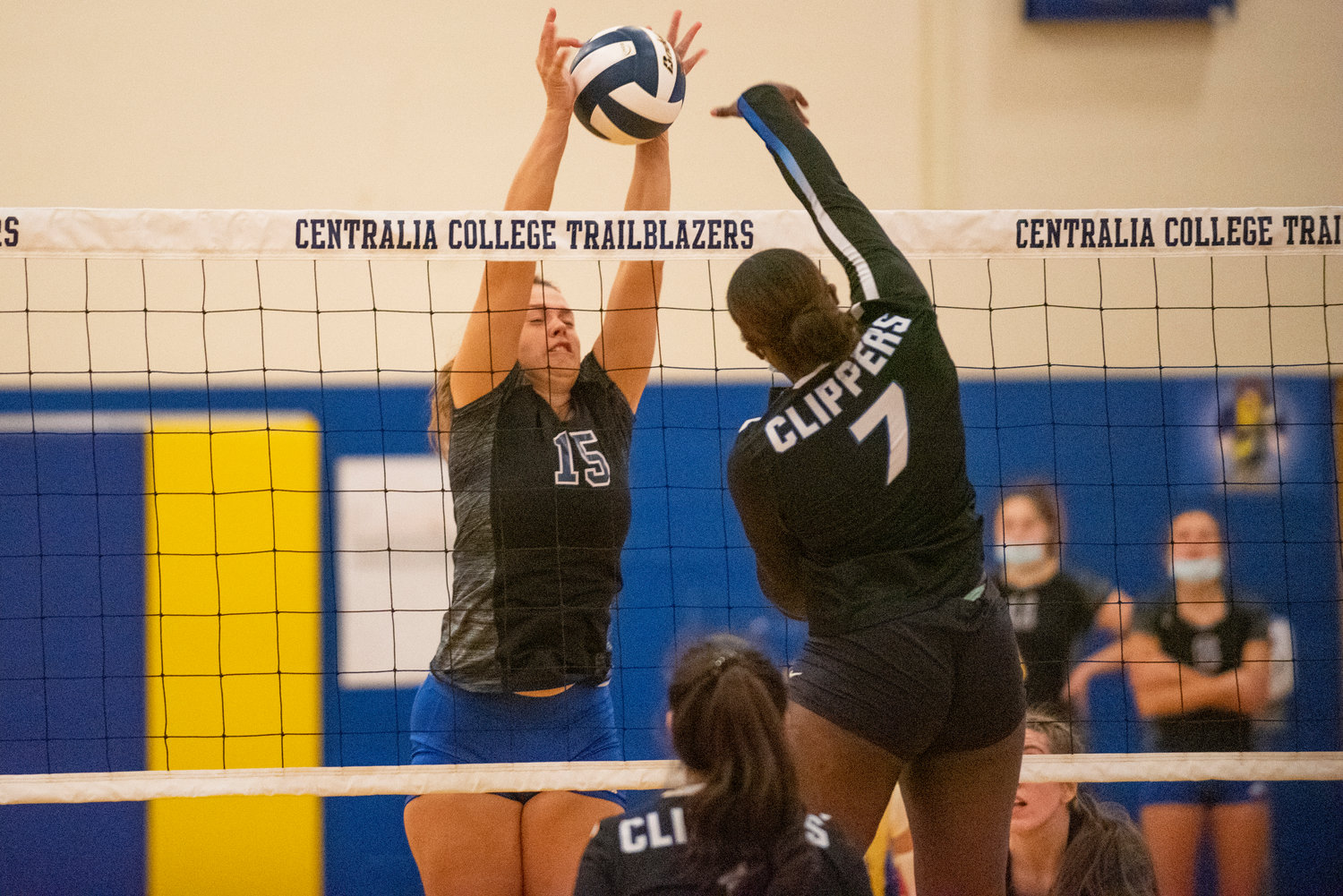 Centralia College's Ayzha Fuller (15) blocks a shot by South Puget Sound's Jahnessa Hill (7) during a match Wednesday in Centralia.