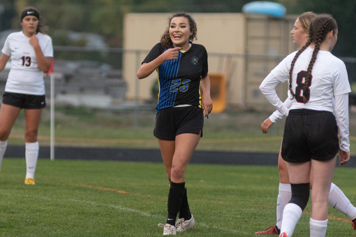 Adna senior Presley Smith smiles after scoring a goal in the Pirates game against Ocosta Wednesday night.