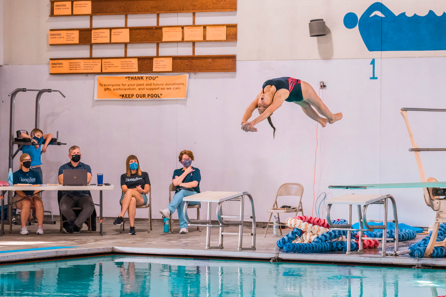 A Black Hills diver takes air at Thorbeckes in Centralia during a meet Thursday afternoon.