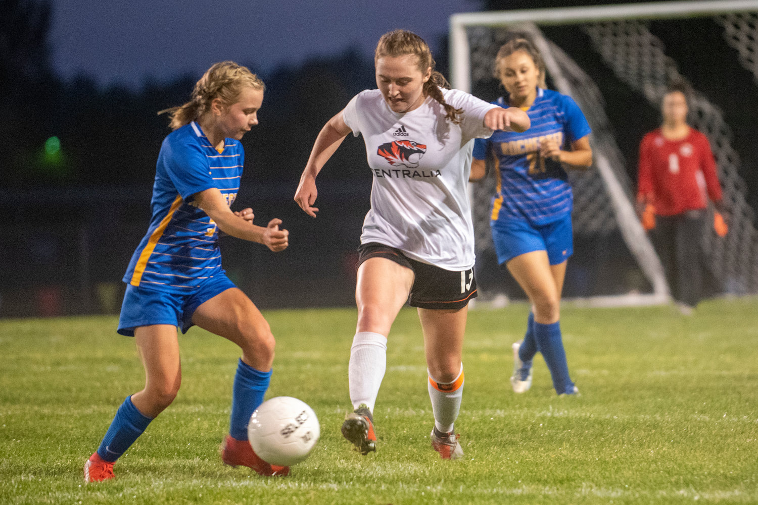 FILE PHOTO -- Centralia's Sarah Robbins (13) dribbles against Rochester's Piper Quarnstrom(5) in a match earlier this season.