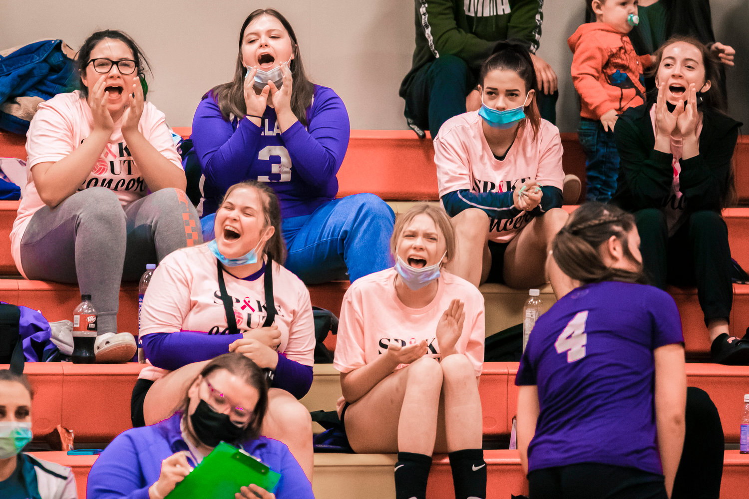 Logger fans cheer during an away game in Winlock on Thursday.