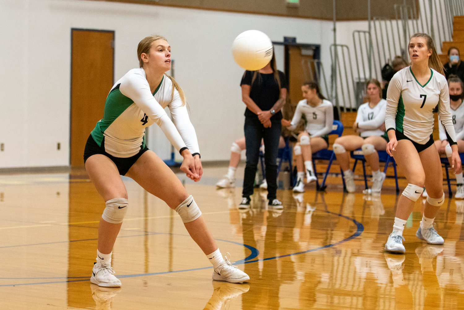 Tumwater's Sydney Hanson (4) works in serve receive against Rochester on Oct. 19, 2021.