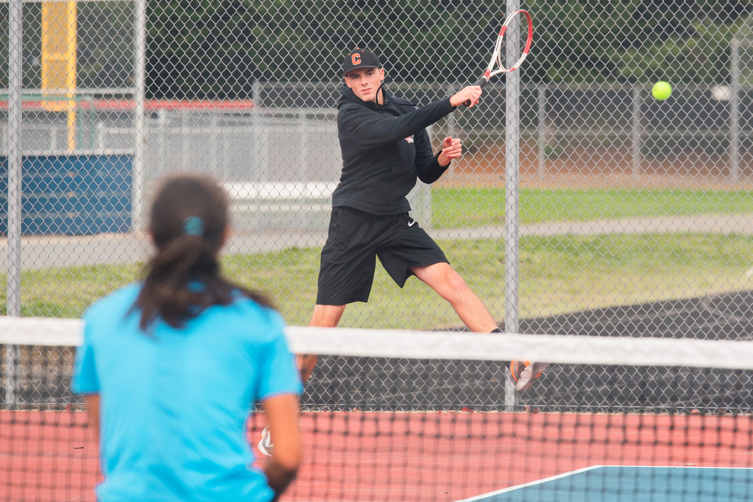 Centralia’s Landon Kaut scores with a shot across the net Tuesday afternoon at Black Hills High School.