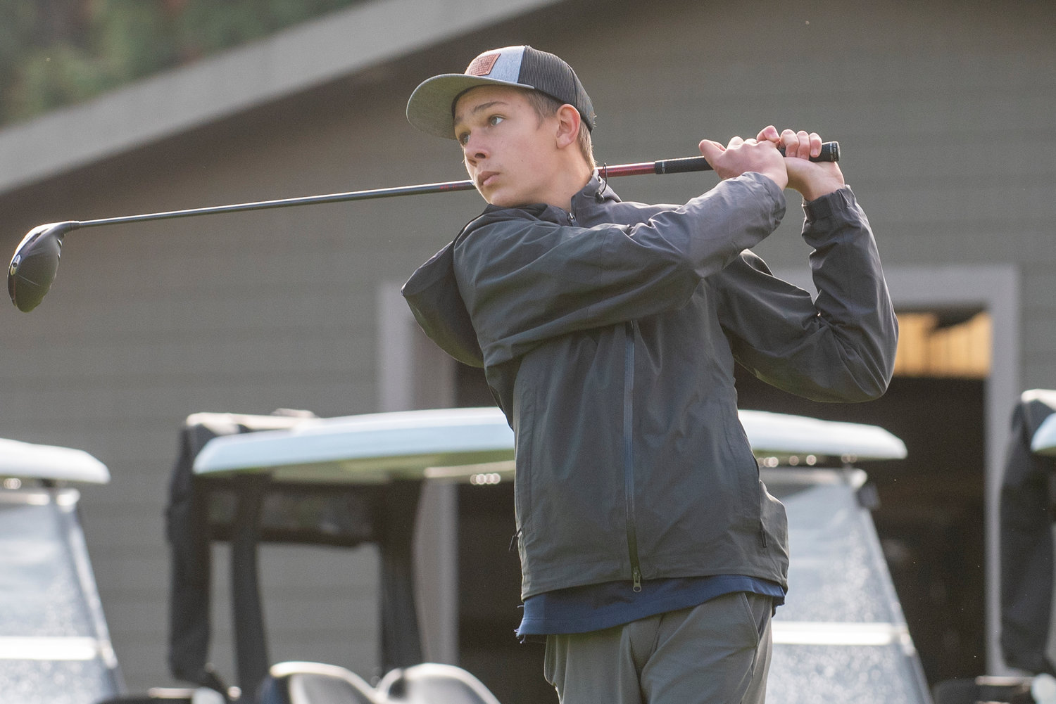 Black Hills junior Luke Fenner tees off on Day One of the 2A District 4 Boys Golf Tournament at Riverside Golf Course in Chehalis on Oct. 20, 2021.