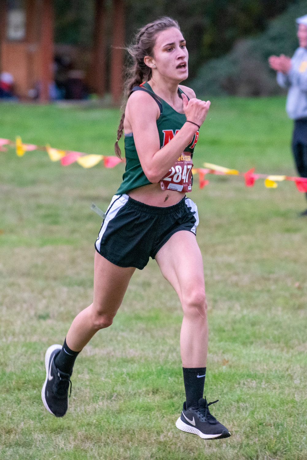 Morton-White Pass senior Jordan Koetje approaches the finish line of the 2B Central League cross country championships on Oct. 21, 2021.