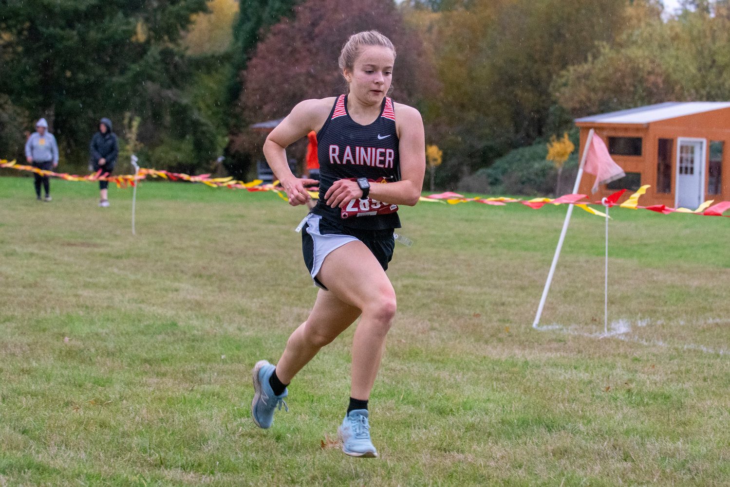 Rainier senior Selena Niemi crosses the finish line in first at the 2B Central League cross country championships on Thursday, Oct. 21, 2021, in Onalaska.
