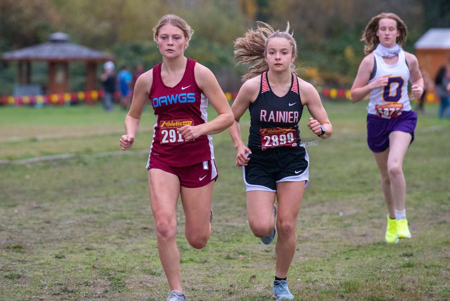 Rainier senior Selena Niemi, right, captured first place at the 2B Central League cross country championships in Onalaska on Thursday, Oct. 21, 2021.