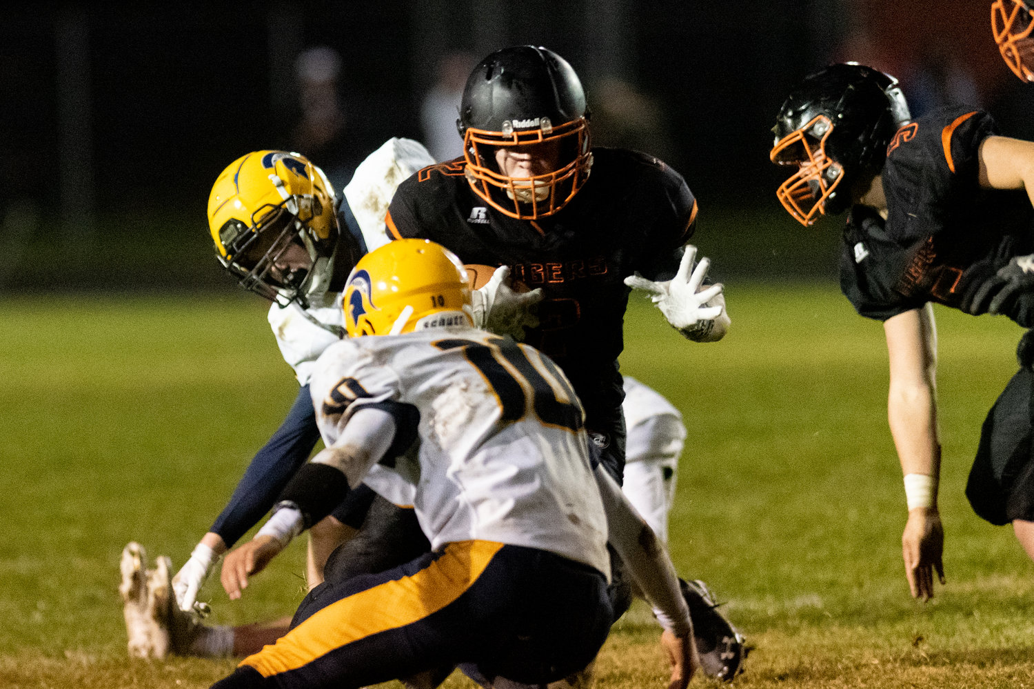 Napavine tailback Cael Stanley tries to elude a Forks defender Oct. 22.