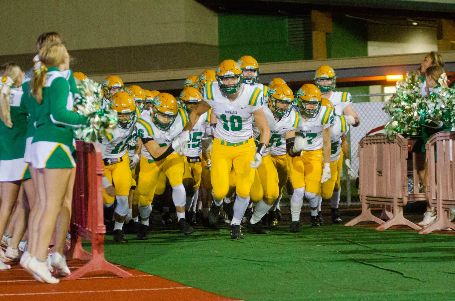 The T-Birds get ready to enter the gridiron at Friday night’s Pioneer Bowl against Black Hills. Tumwater won the game in a decisive 50-7 victory.