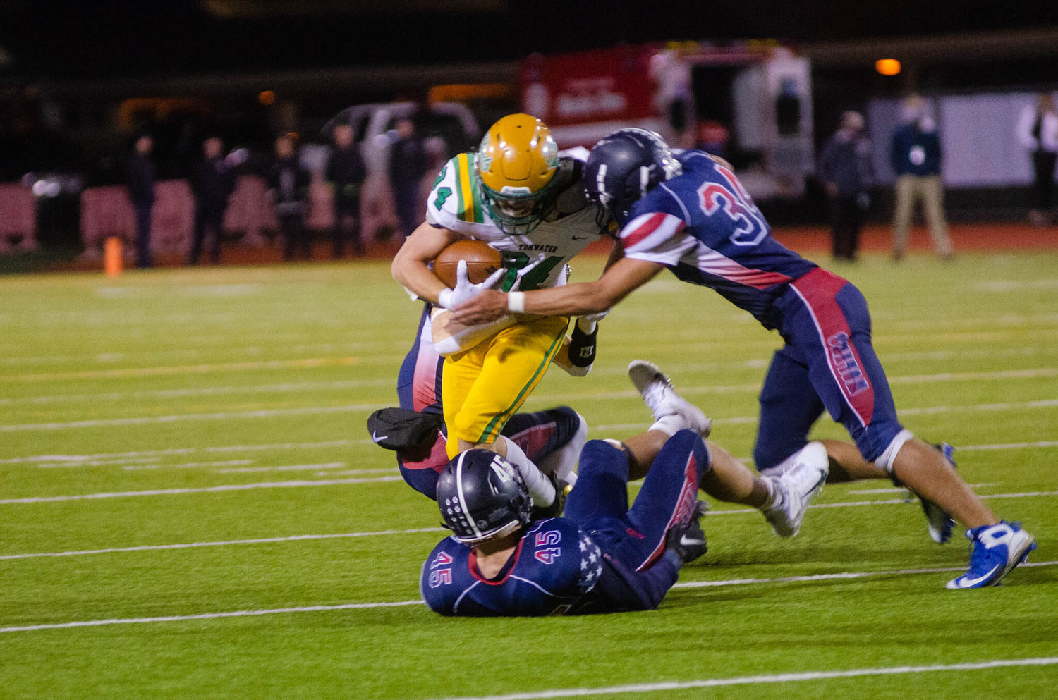 Tumwater’s Payton Hoyt rushes the ball Friday night at the 22nd Annual Pioneer Bowl.