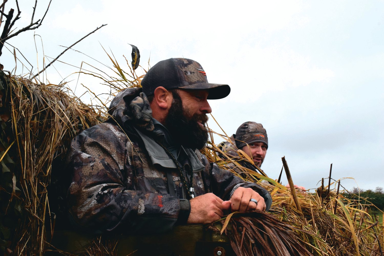 The Fallen Outdoors president Branden Trager, left, and member Josh James sit in a blind at the Ridgefield National Wildlife Refuge during a Veterans Day hunt on Nov. 11.
