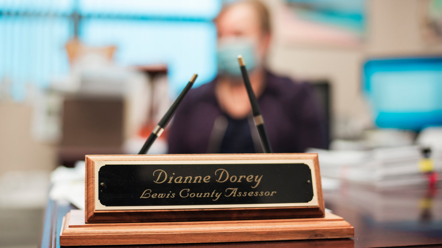 A plaque reads "Dianne Dorey Lewis County Assessor" at the Lewis County Courthouse.