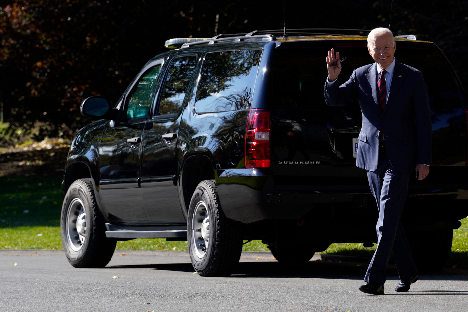 President Joe Biden waves as he walks on the South Lawn of the White House in Washington, D.C., before going to New Hampshire on Tuesday, Nov. 16, 2021. (Yuri Gripas/Abaca Press/TNS)