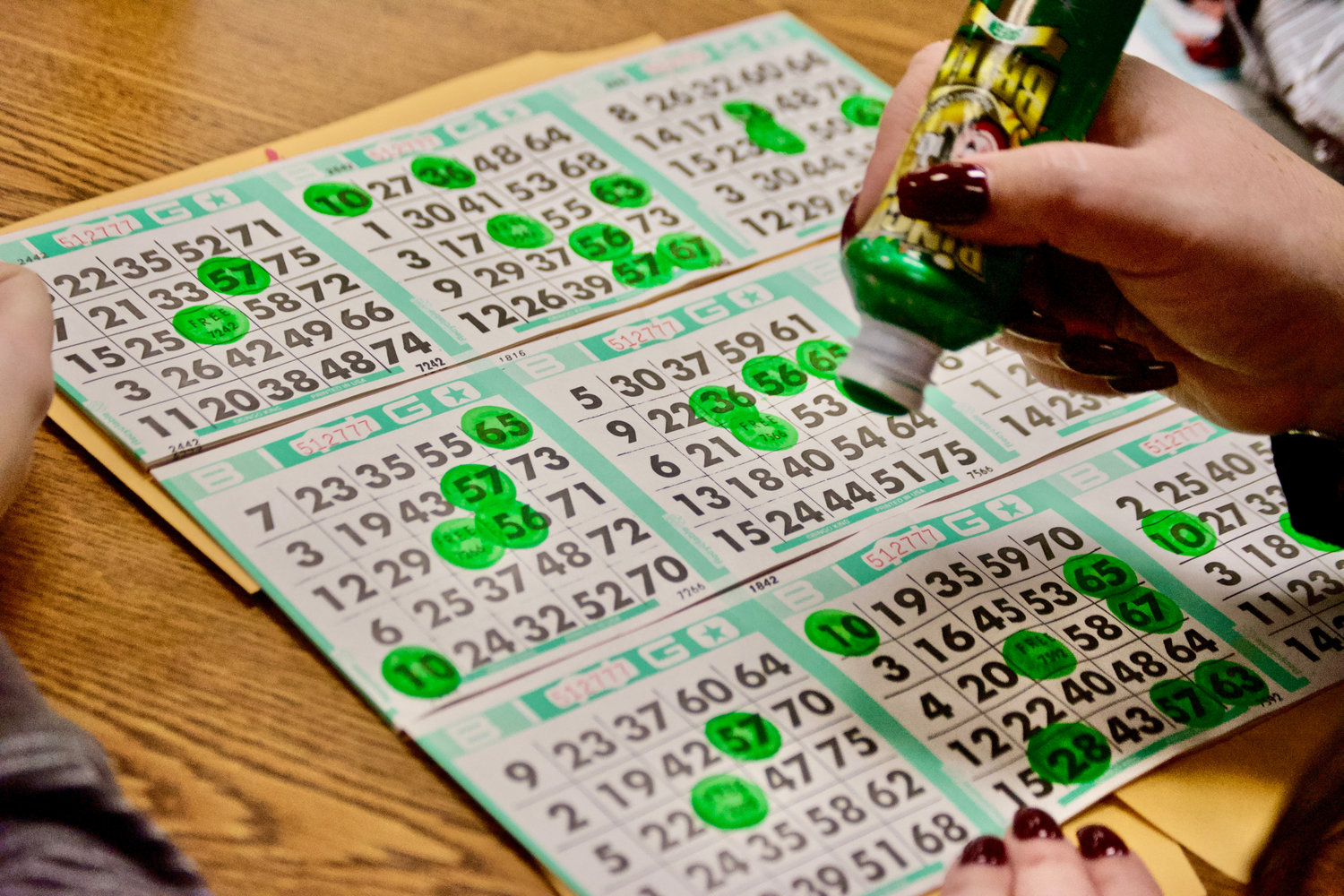 Bingo cards sold for $1 were marked by players Saturday night at the Chehalis Eagles event space. Proceeds went to the Twin Cities Rotary.