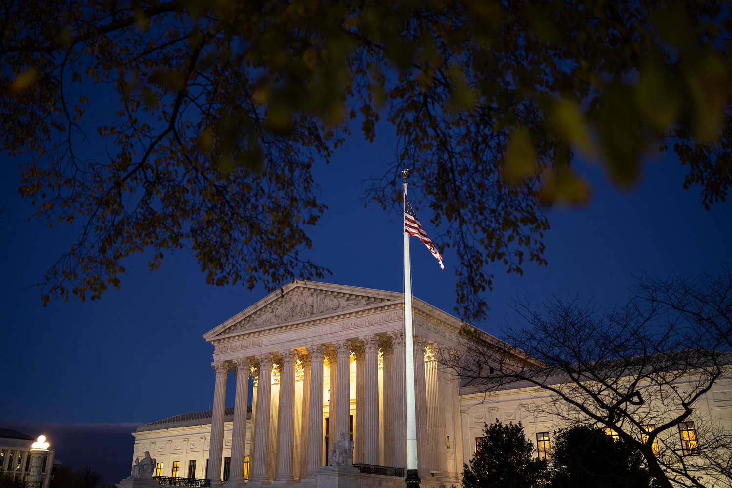 A view of the U.S. Supreme Court at dusk on Monday, Nov. 29, 2021 in Washington, D.C. On Wednesday, the Supreme Court will hear a case concerning a Mississippi law that would ban abortions after 15 weeks of pregnancy. (Drew Angerer/Getty Images/TNS)
