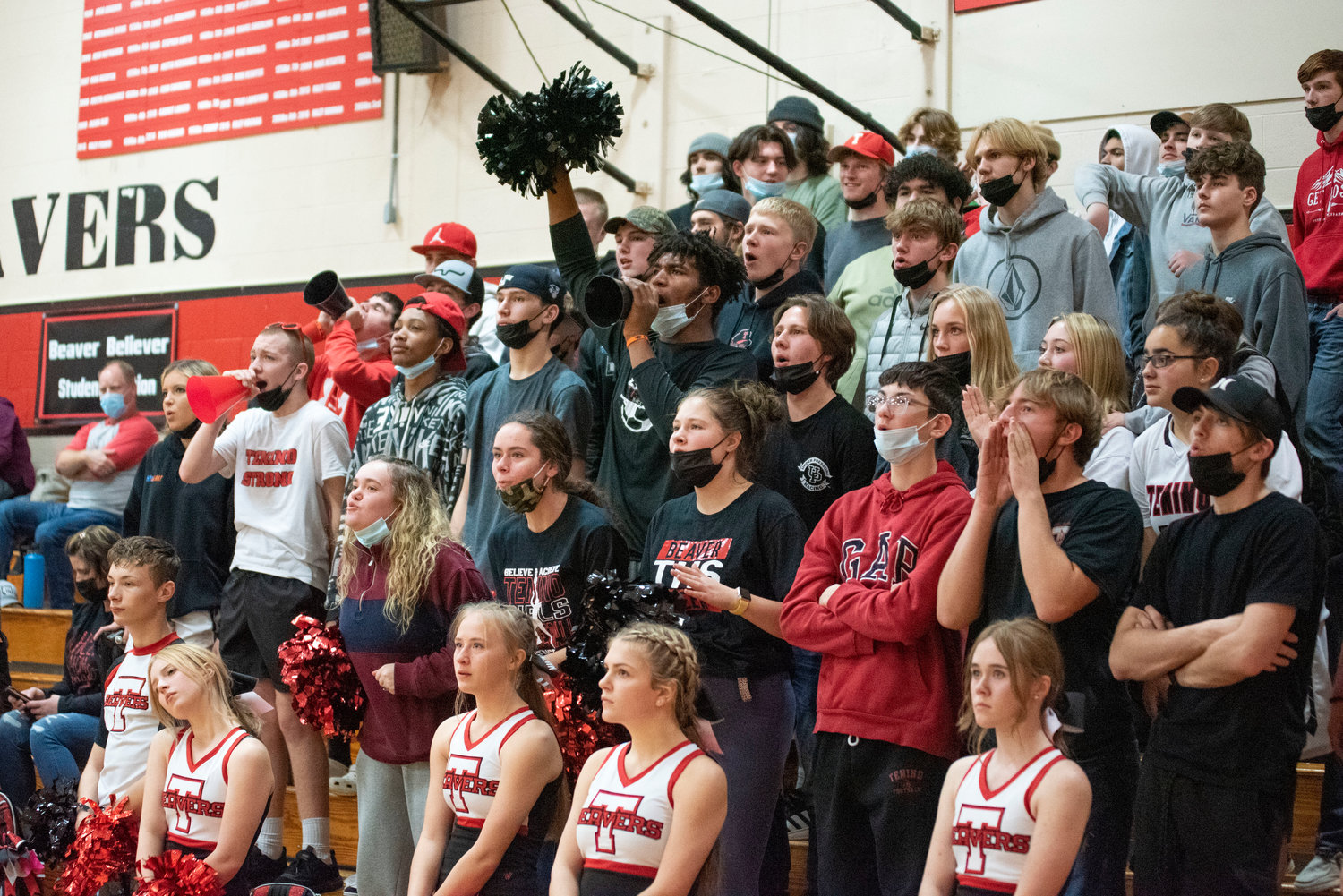Tenino's student section cheers for the Beavers' girls basketball team on Dec. 2.
