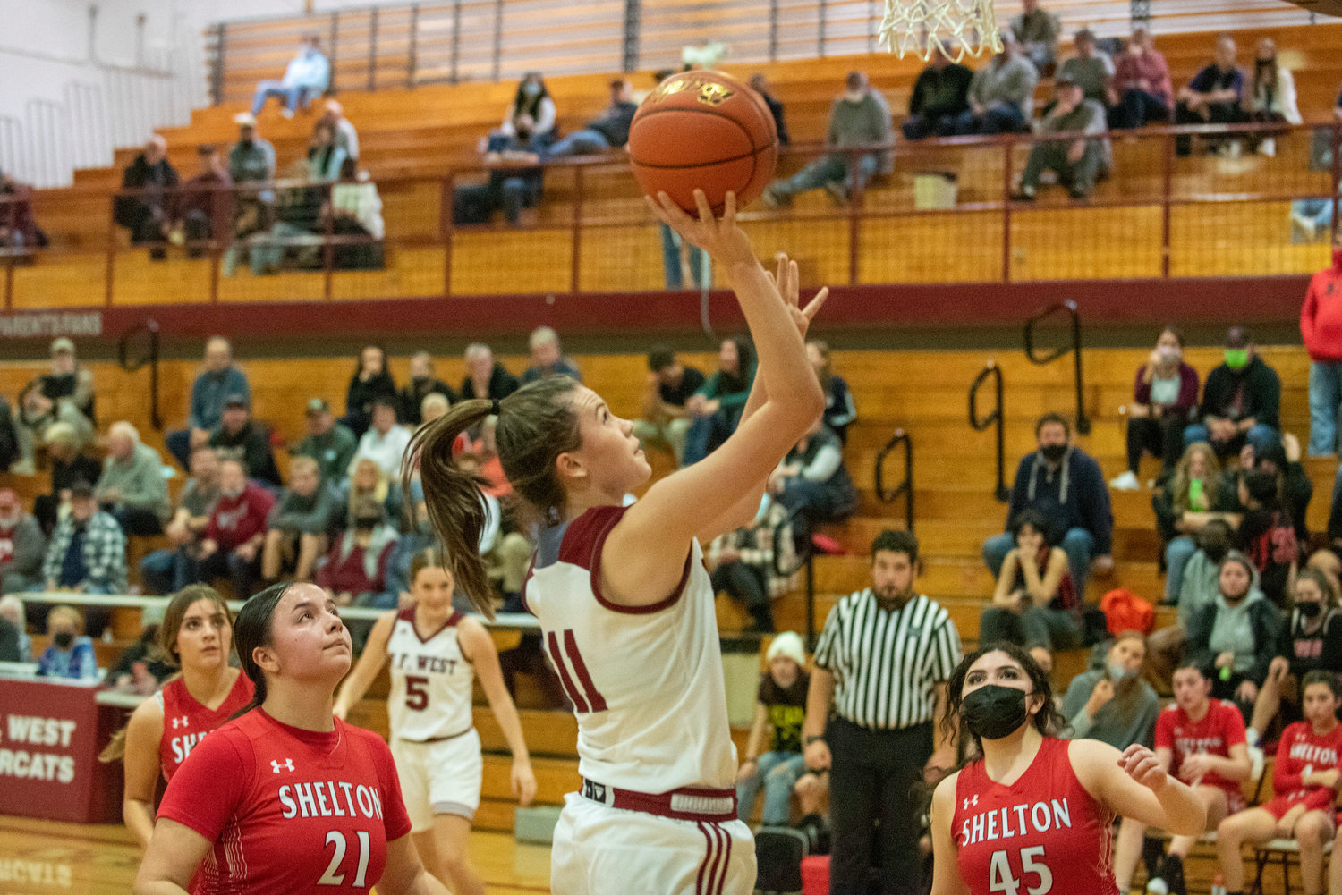 W.F. West's Olivia Remund (11) goes up for a layin against Shelton on Dec. 7.