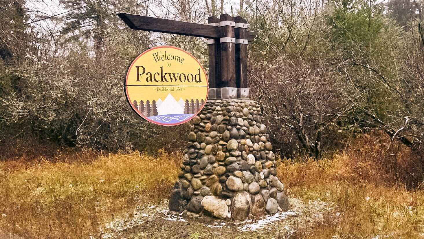 A sign reads, “Welcome to Packwood” along Highway 12.