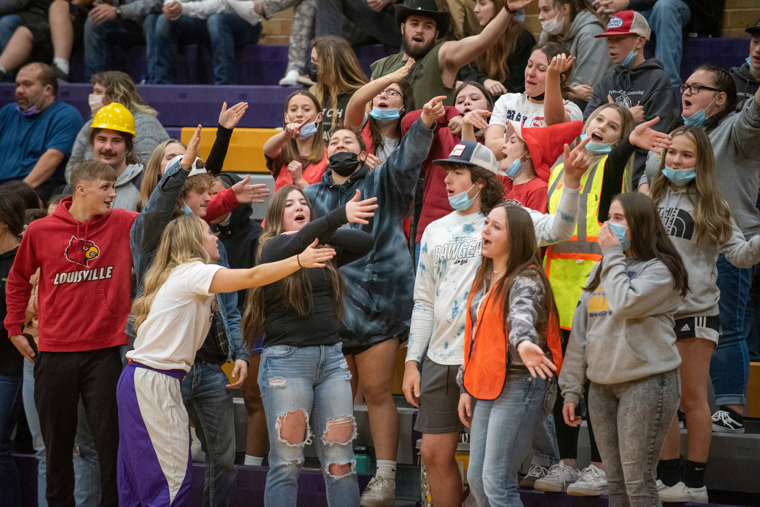 Onalaska's student section cheers during a game against Winlock on Dec. 9..
