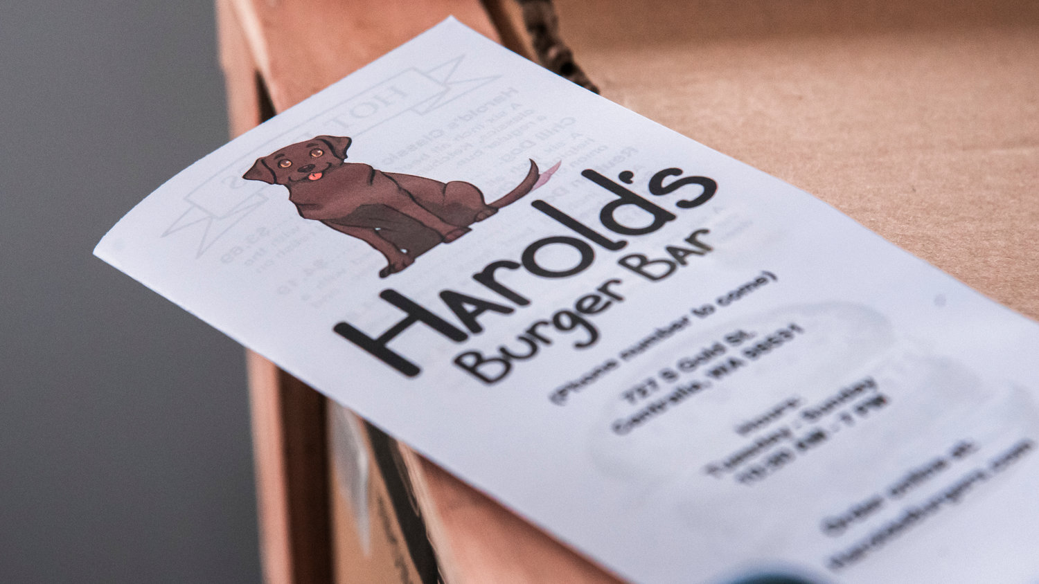 A brochure for Harold’s Burger Bar sits atop a new grill awaiting installation in Centralia.