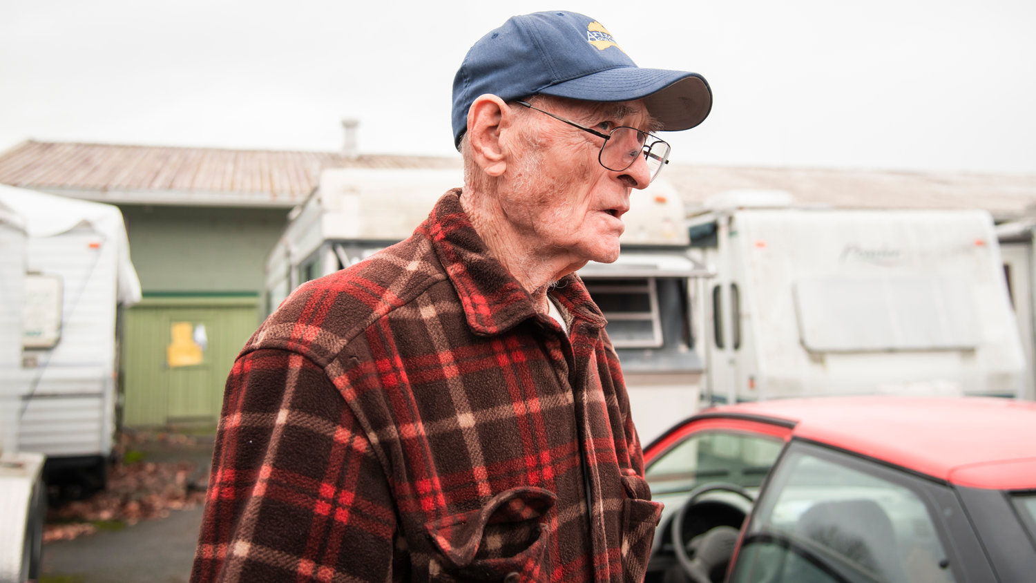 Willard Gabbard, 85, talks about living in a trailer outside Yard Birds for the past 12 years after his retirement and how he wants to stay, describing a six-month waitlist for other trailer parks.