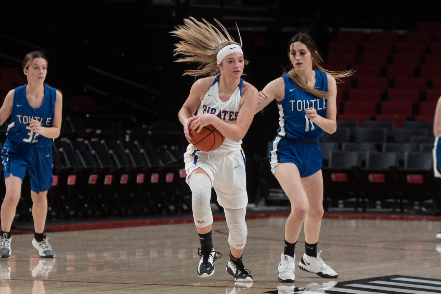 Adna guard Kaylin Todd takes the ball away from a Toutle Lake player at the Moda Center in Portland Dec. 18.