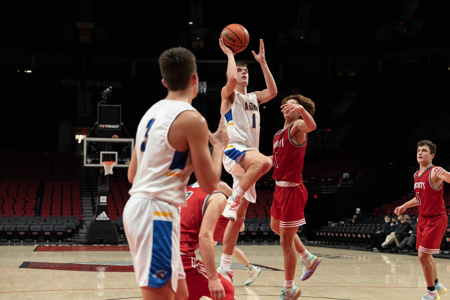 Adna guard Seth Meister attempts a floater against Castle Rock at the Moda Center in Portland Dec. 18.