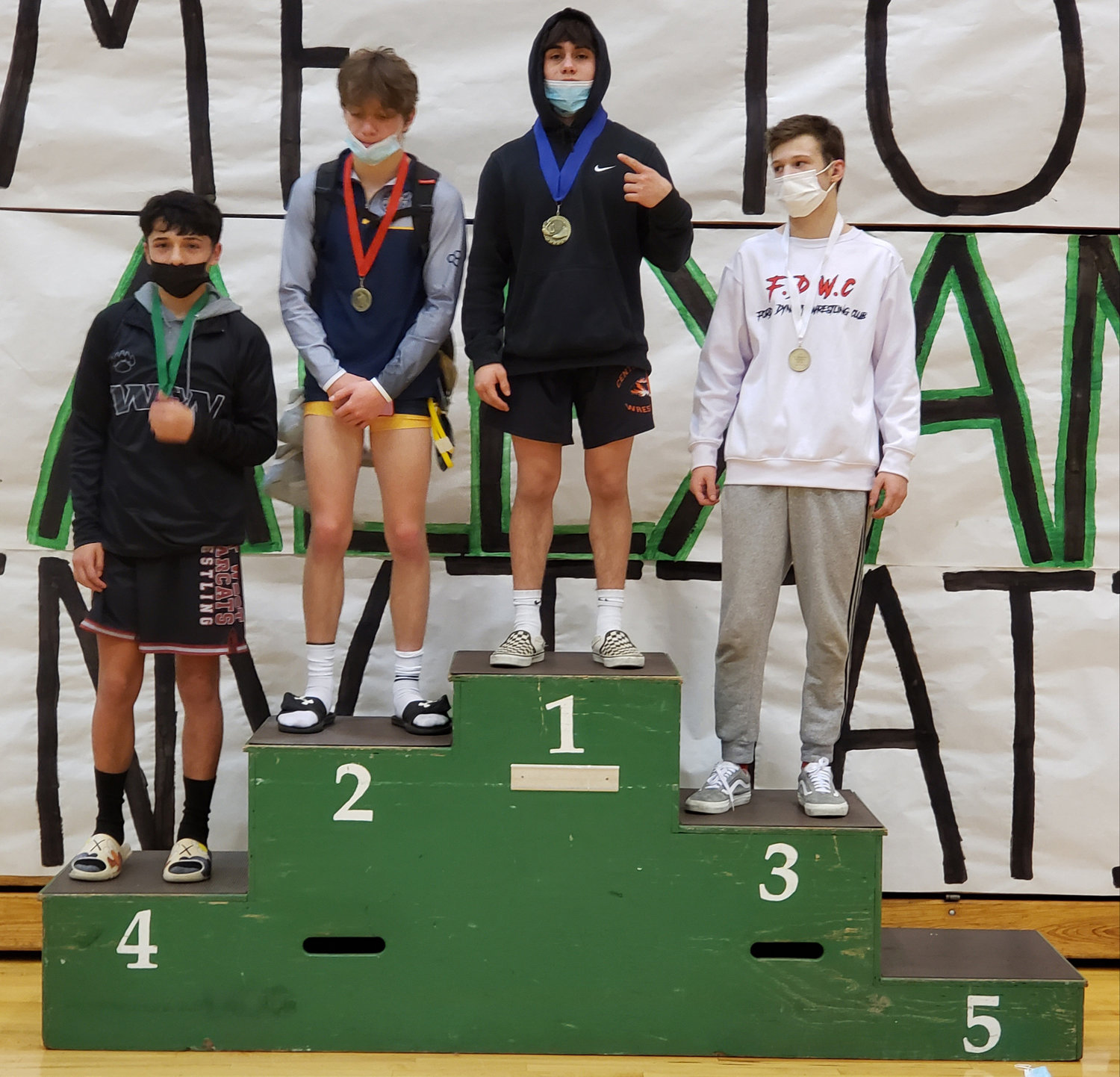Centralia sophomore Antonio Campos, third from left, won the boys 120-pound division at the Pat Alexander Invite at Tumwater High School on Dec. 18.