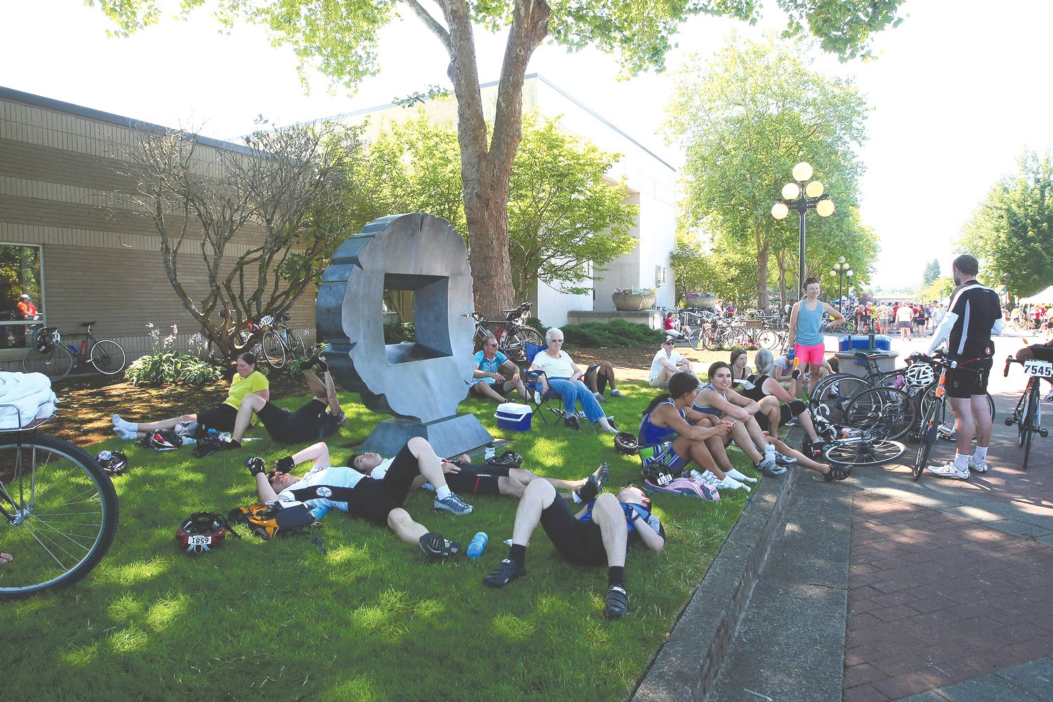 Riders packed together in the shade of the trees on the Centralia College campus to escape the heat and catch a breath in this 2014 Chronicle file photo.