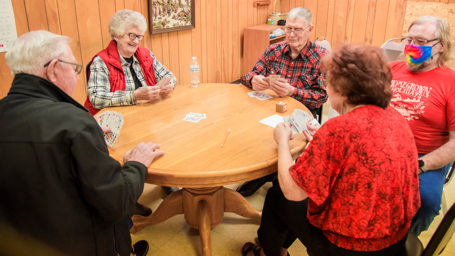 Visitors play cards at the Morton Senior Center located at 103 Westlake Avenue in Morton on Wednesday.