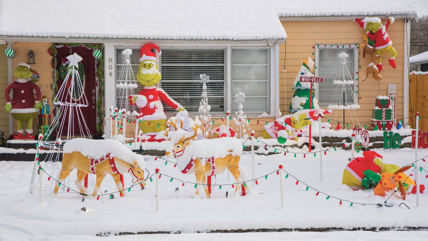 Snow blankets Christmas decor in the 800 block of North Pearl Street in Centralia.