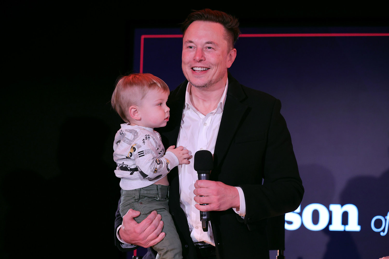 Elon Musk and son X Æ A-12 on stage for the  TIME Person of the Year on Dec. 13, 2021 in New York City. (Theo Wargo/Getty Images for TIME/TNS)