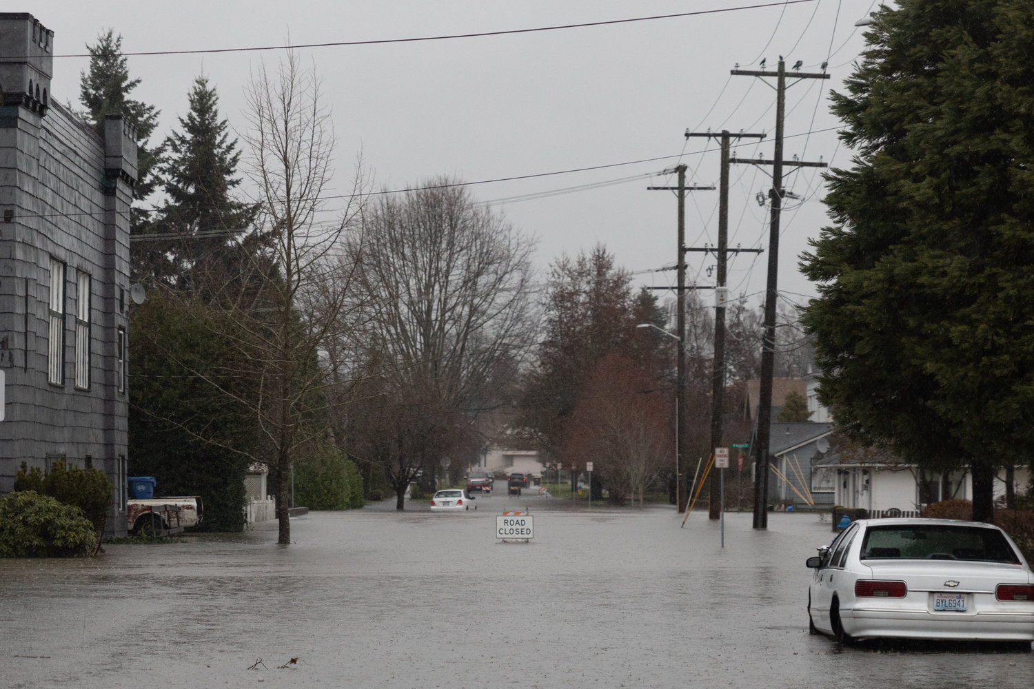 North Iron Street is covered in flooding waters at 1 p.m. on Thursday in Centralia.