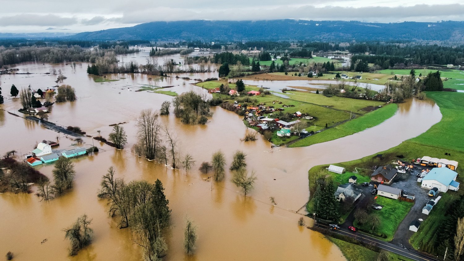 The Chehalis River overflows on to nearby properties in Rochester earlier this month.