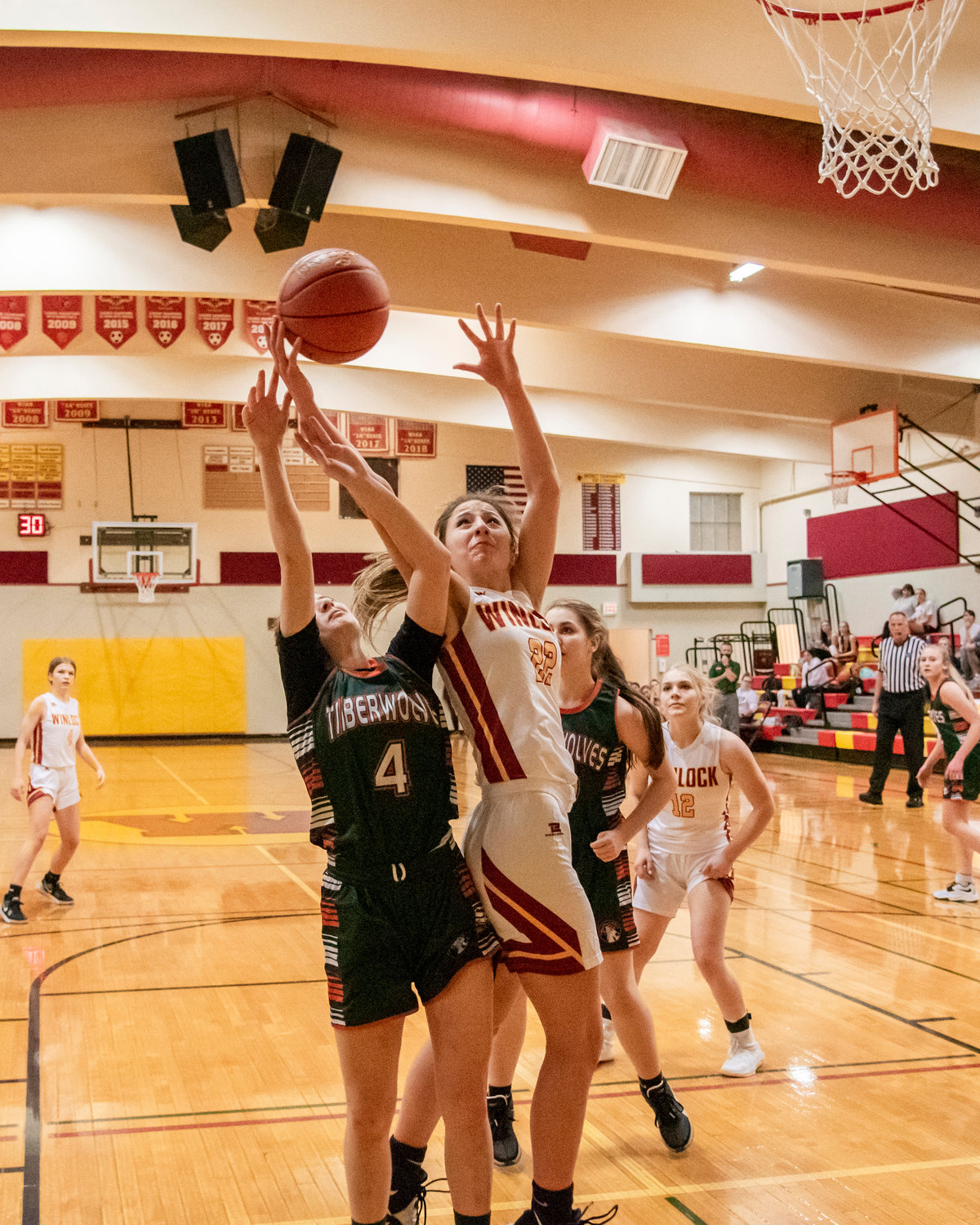 Athletes fight for a rebound Tuesday night in Winlock.