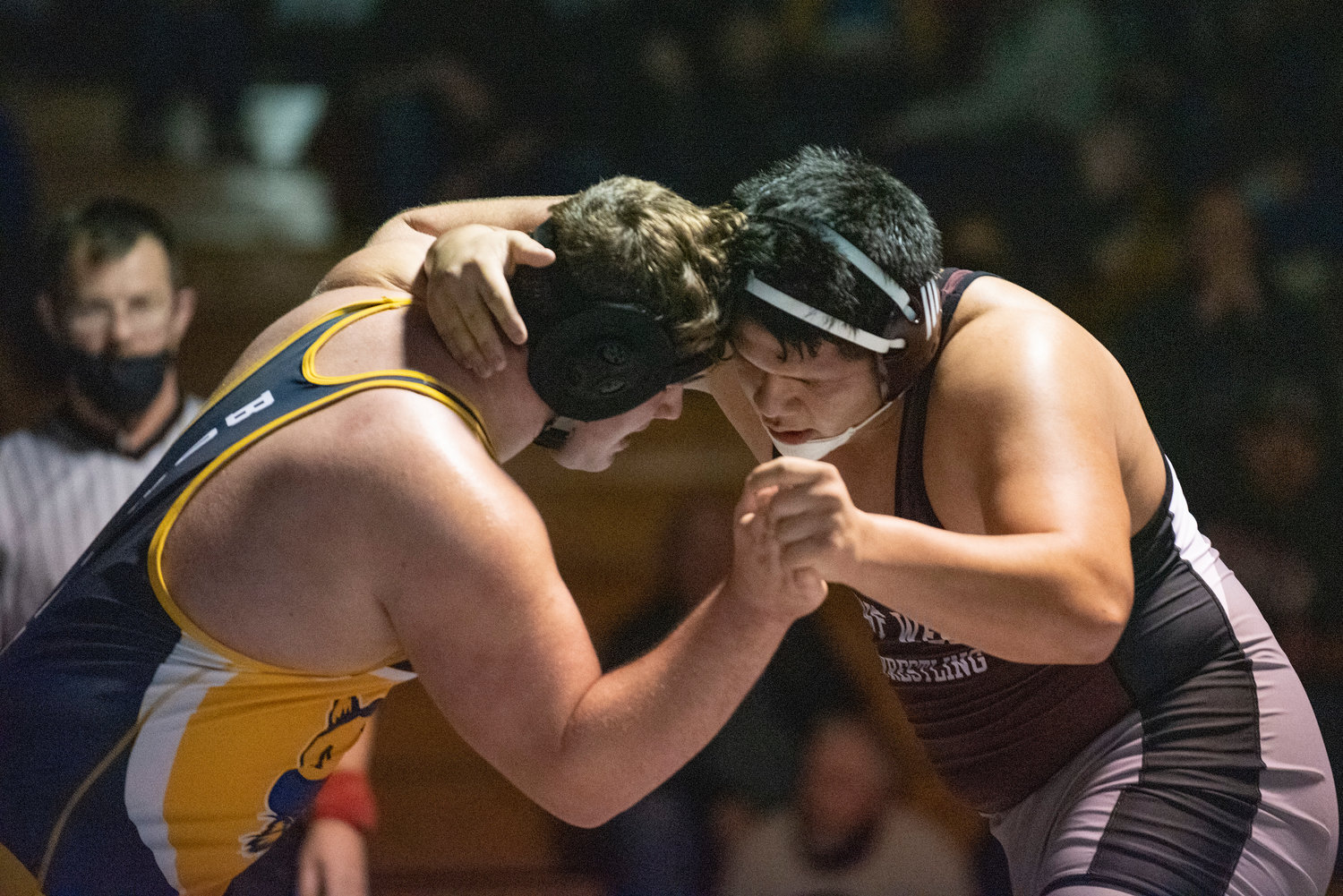 W.F. West's Daniel Matagi, right, locks up with Aberdeen's Erick Hayter-Ramsey during a home dual match on Jan. 12.