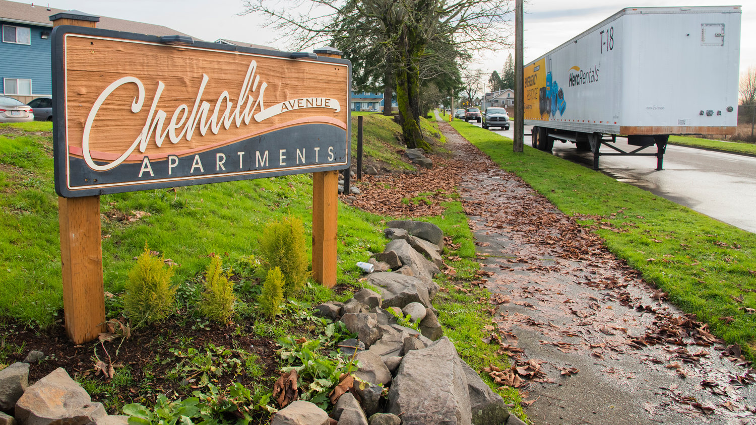 A Herc Rentals Emergency Response trailer sits parked outside the Chehalis Avenue Apartments on Wednesday after multiple units experienced flooding.