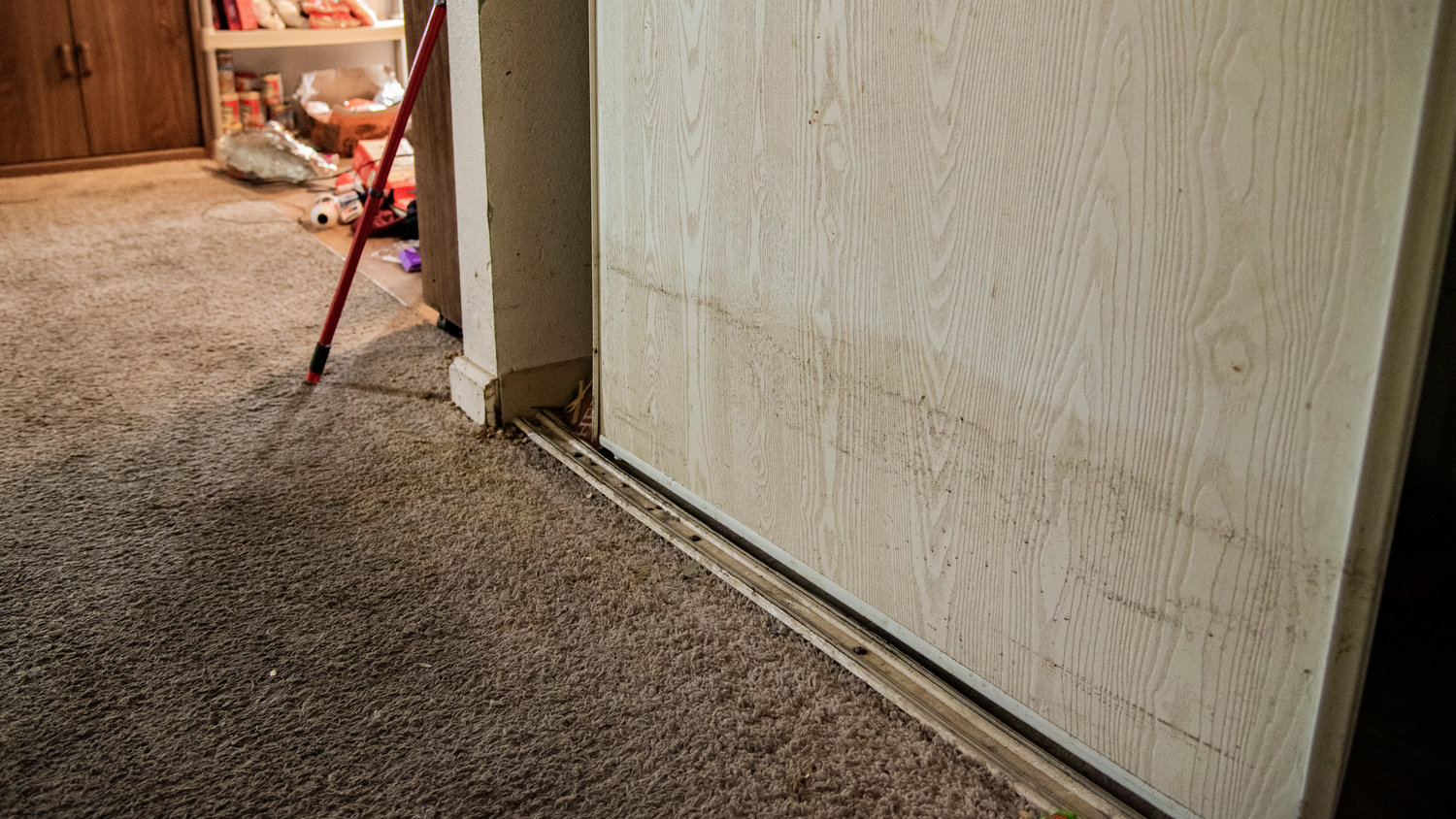 The water line is visible inside Alicia Cook’s apartment building after flood water flowed into multiple rooms damaging furniture and belongings at the Chehalis Avenue Apartments.