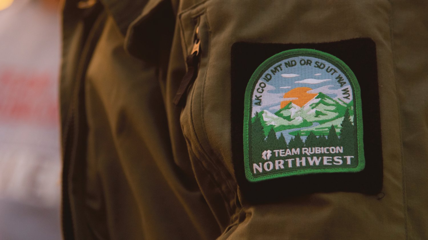 A Team Rubicon Northwest patch is displayed on the jacket of Karl Kaiyala in Centralia on Wednesday.
